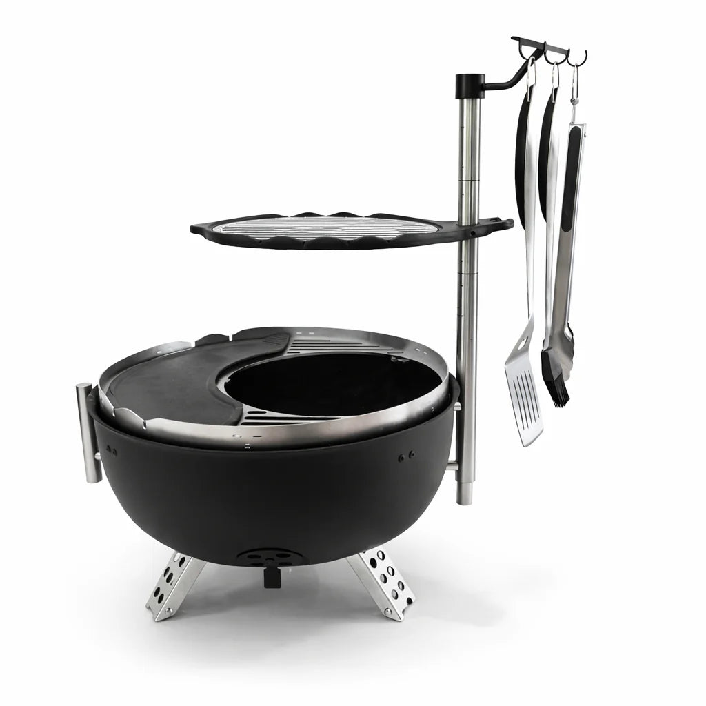 Black portable grill with accessories on a white background