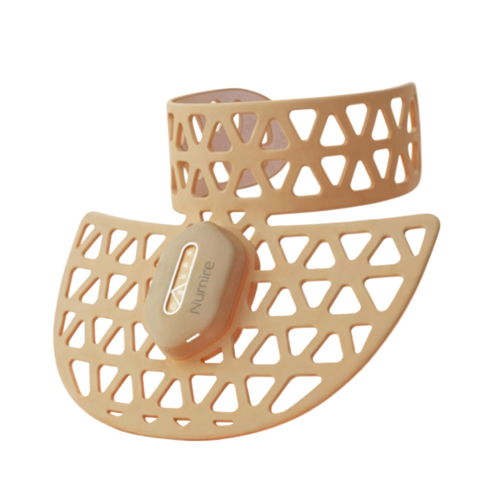 Beige silicone teether with geometric design on a white background