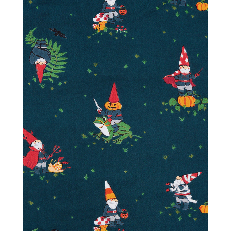 Pattern of gnomes and a frog on a dark blue background