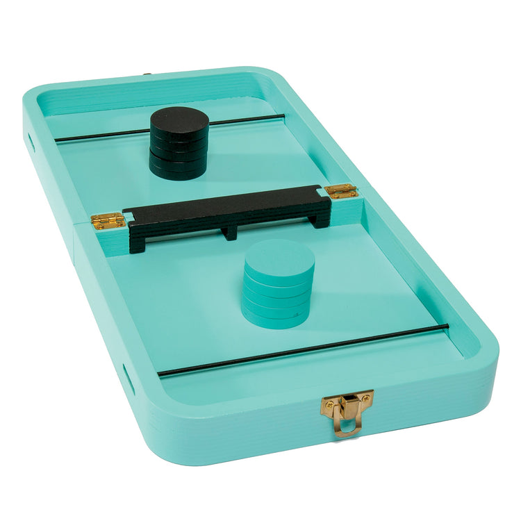 Turquoise tray with black and gold components on a white background