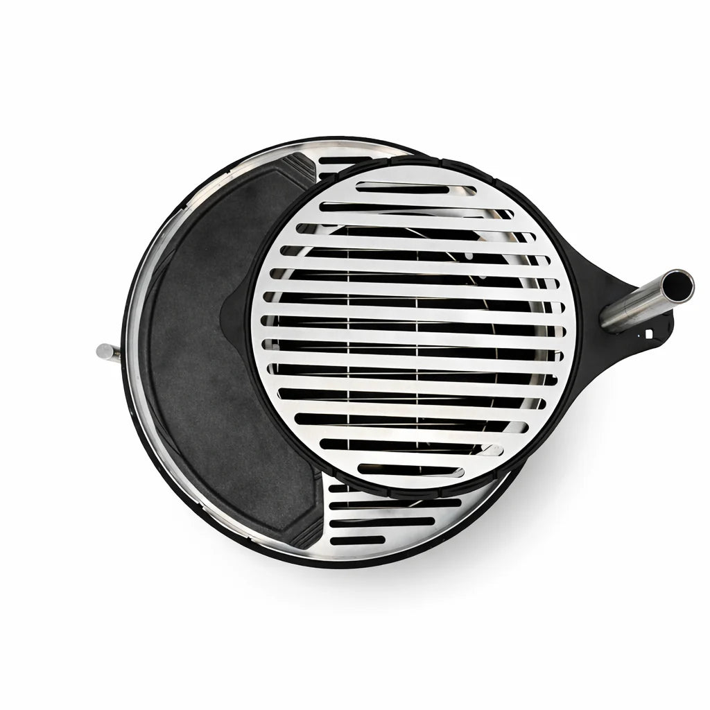 Round metal grill with black interior on a white background
