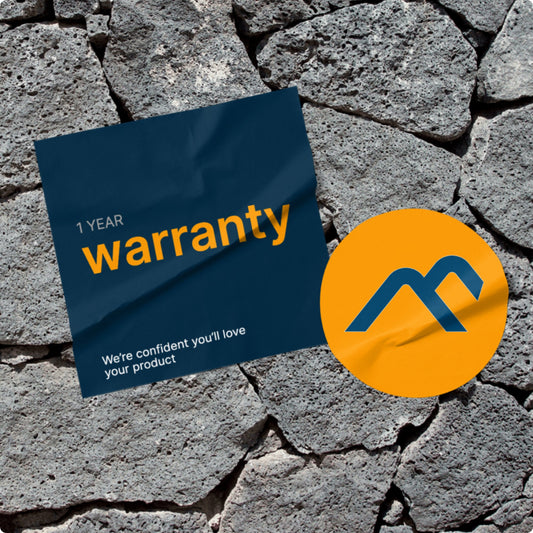 Black heated car seat cover with remote control and cup holder on a white background