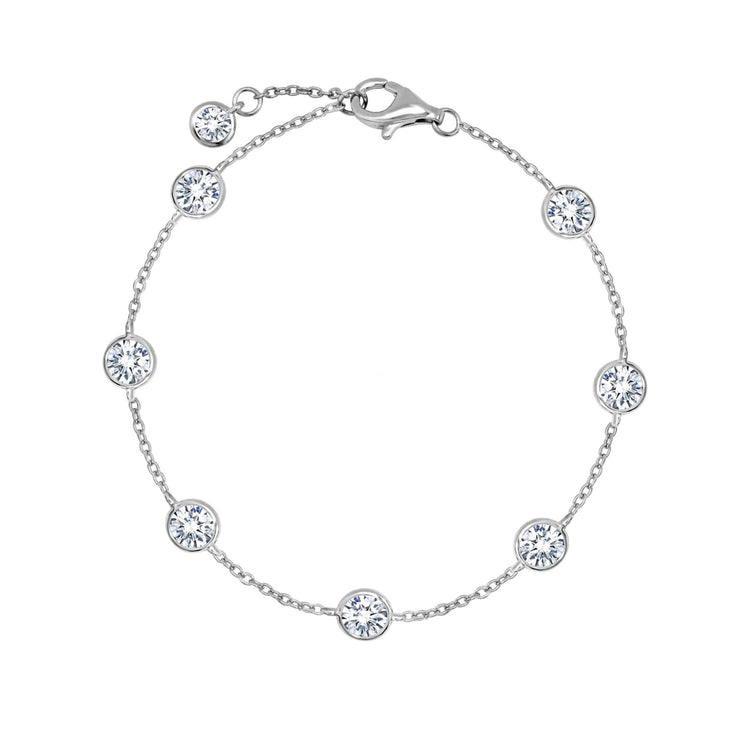 Silver bracelet with clear gemstones on a white background