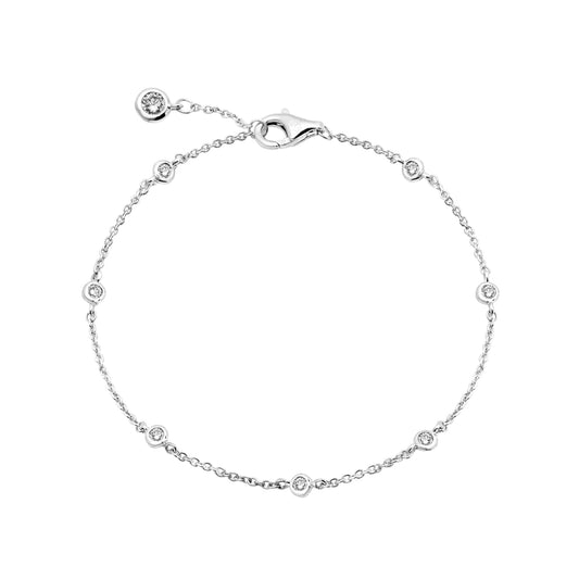 Silver bracelet with small diamonds on a white background