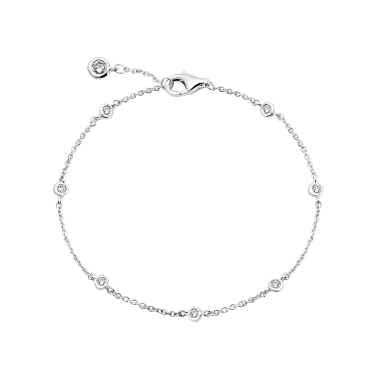 Silver bracelet with small diamonds on a white background
