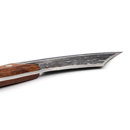 Behold the elegance of the Hakai Cleaver Knife from Seido Knives, with its wooden handle, poised on a cutting board. 