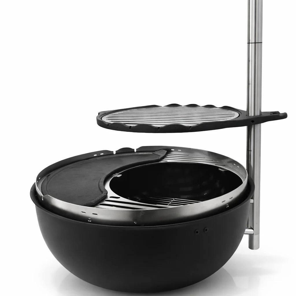 Black outdoor grill with a lid open on a white background
