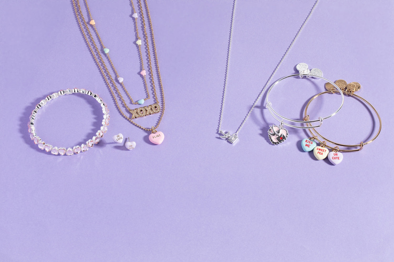 Jewelry set including necklaces and bracelets on a purple background