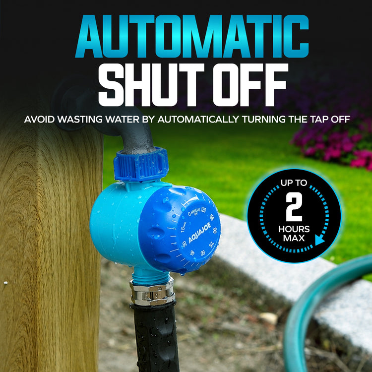 A blue and gray Aquadeck automatic shut-off valve connected to a black garden hose, shown outdoors next to a wooden post with a blurred green lawn background. Text overlays read 'AUTOMATIC SHUT OFF' and 'UP TO 2 HOURS MAX'.