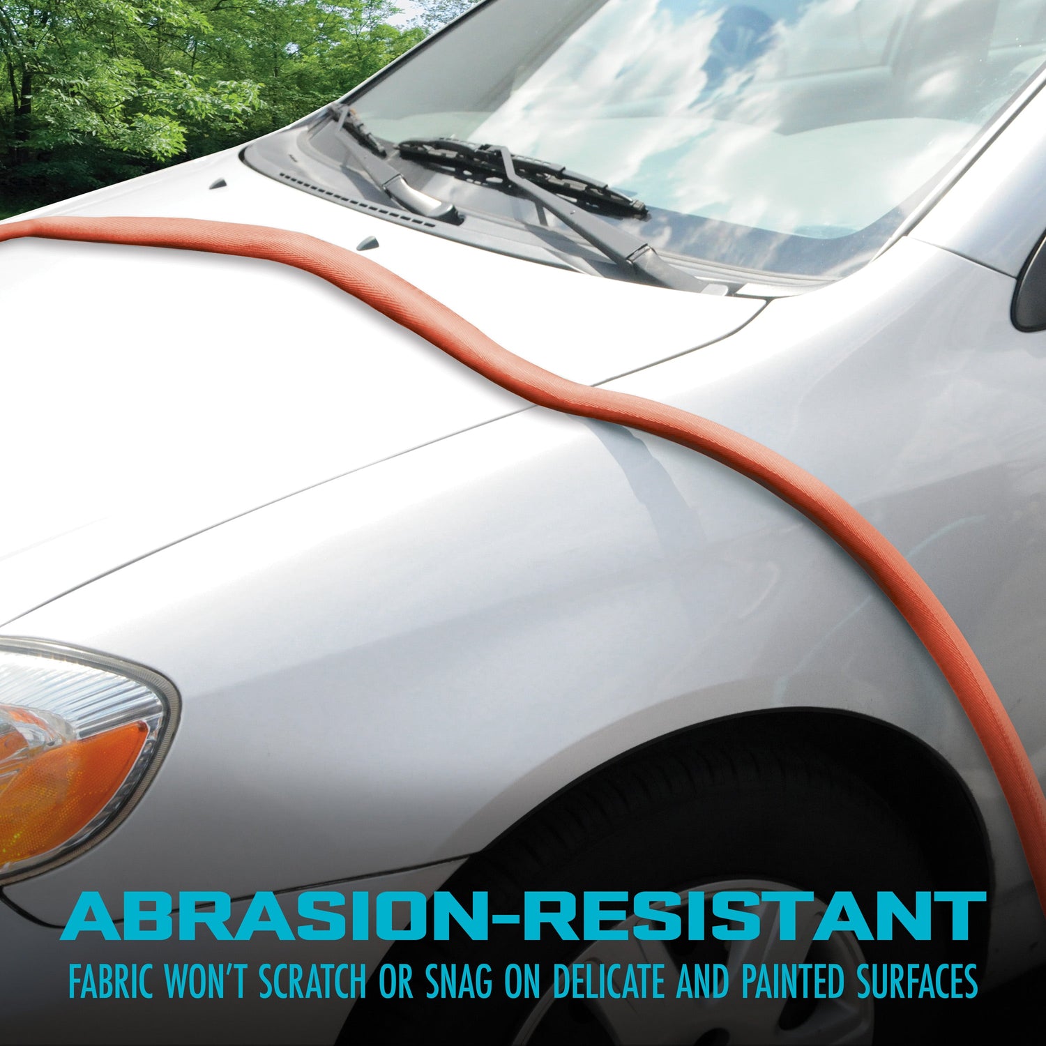 Car with an orange protective fabric on the hood, text indicating abrasion-resistance.