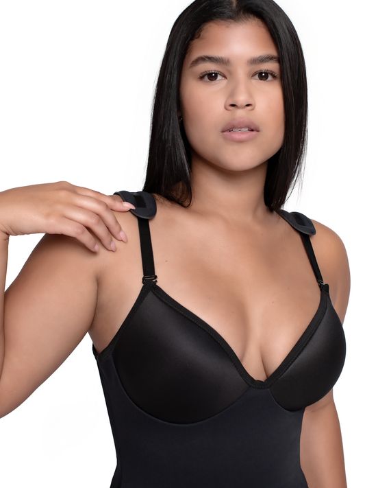 Black swimsuit worn by a model on a white background