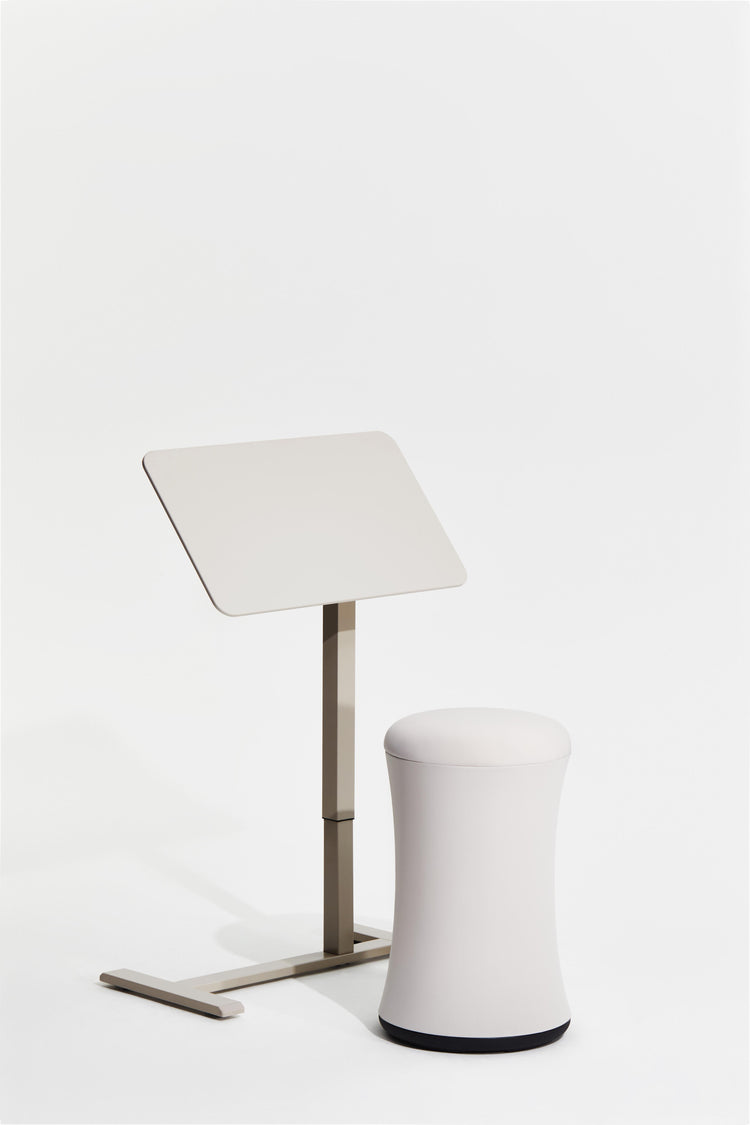 White lamp with a cylindrical base on a white background
