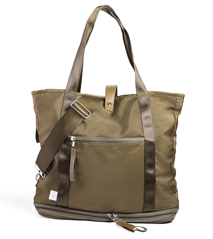 Green tote bag with shoulder strap on a white background
