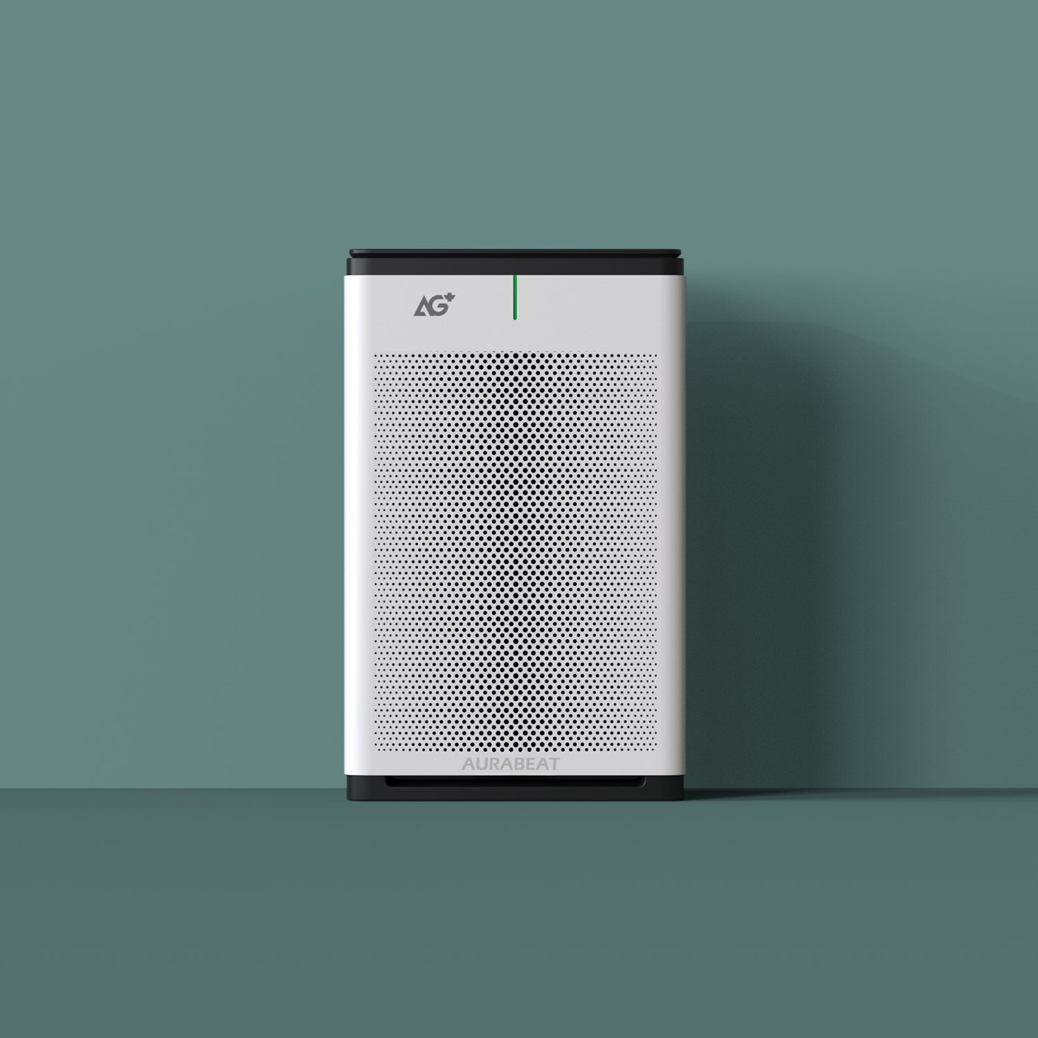 White air purifier with black base on a green background