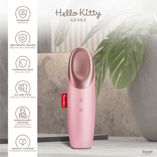 Pink eye massager with Hello Kitty branding on a white background