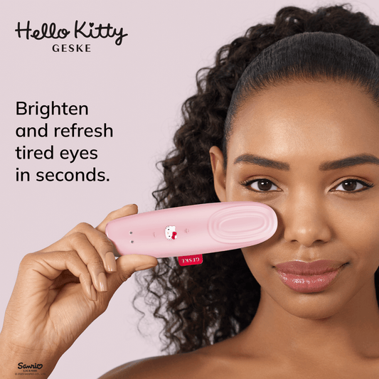 Pink eye massager with Hello Kitty branding on a white background