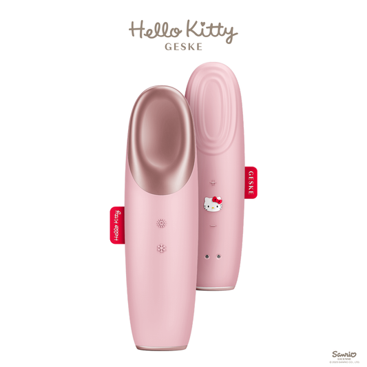 Pink eye massager with Hello Kitty branding on a white background