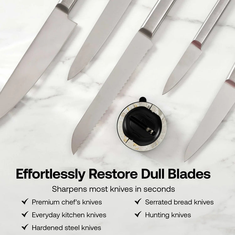 Knife sharpener with knives on a white background
