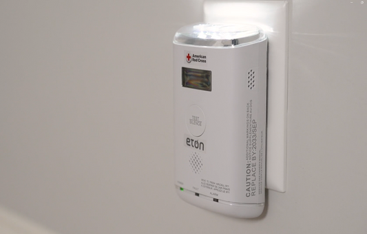 Eaton American Red Cross emergency alert device on a white background