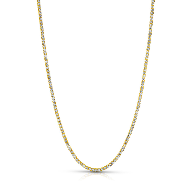 Gold chain necklace on a white background