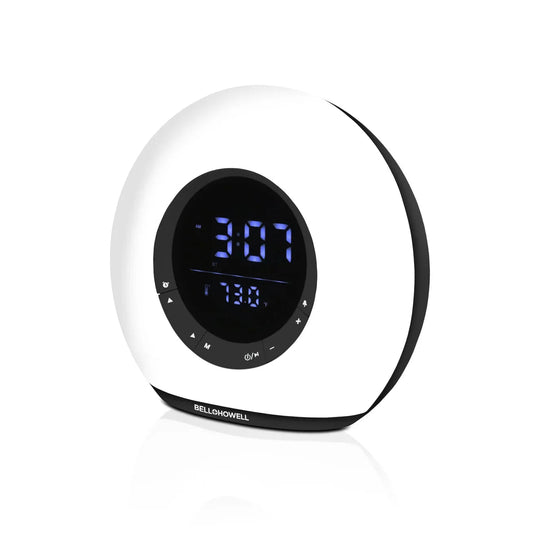 Digital clock with white casing and black display on a white background