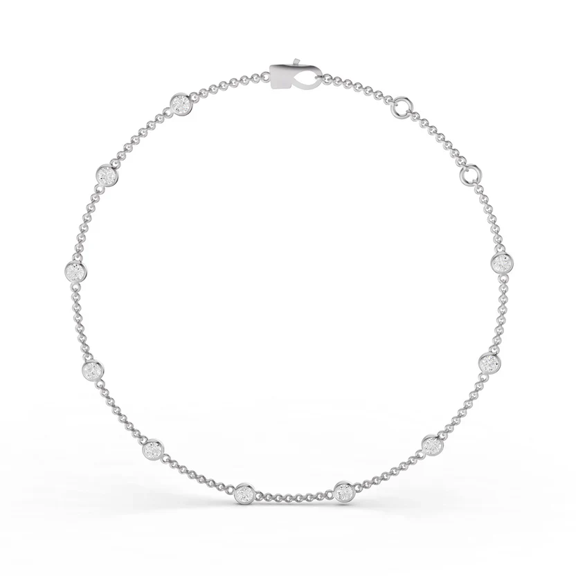 Silver bracelet with small round beads on a white background