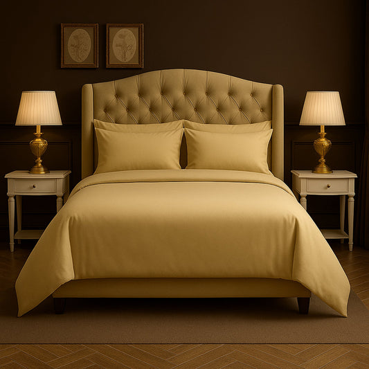Neatly made bed with white bedding and pillows in a room with wooden nightstands and lamps.