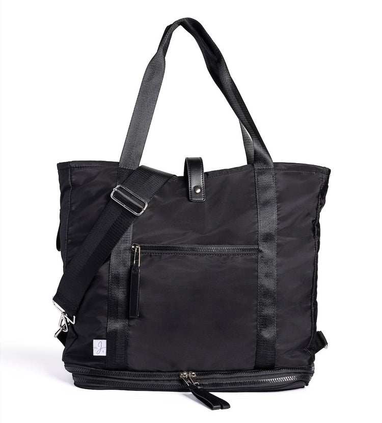 Black tote bag with shoulder strap on a white background