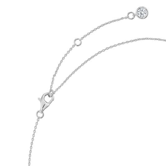 Silver necklace with a round diamond pendant on a white background