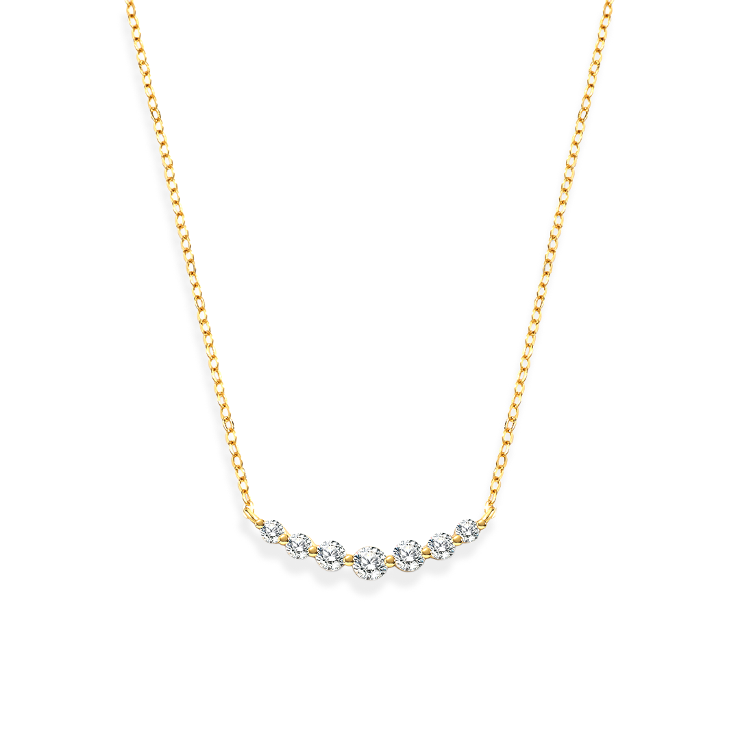 Gold necklace with small diamonds on a white background