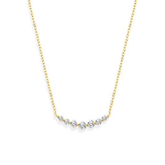 Gold necklace with small diamonds on a white background