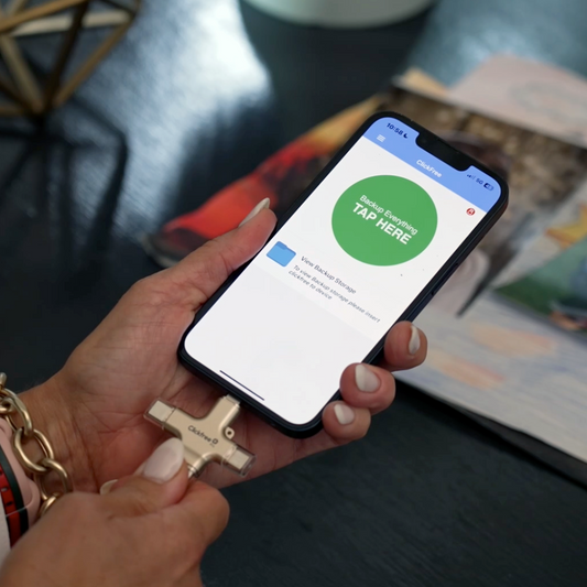 Clickfree Pro device with smartphone app display on a white background