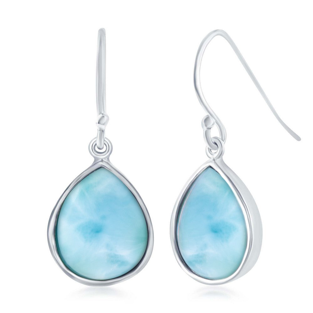 Teardrop-shaped earrings with light blue stones and silver hooks on a white background