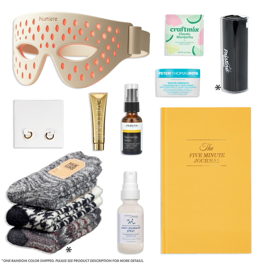 Collection of various items including a sleep mask, socks, and skincare products on a white background.
