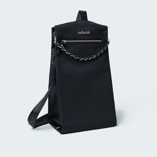 Black handbag with chain detail on a white background