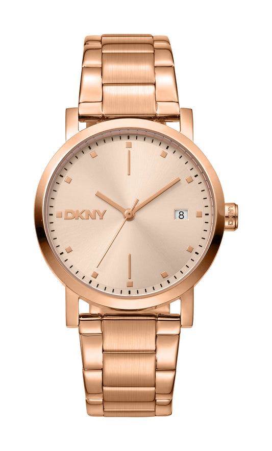 Rose gold DKNY watch on a white background