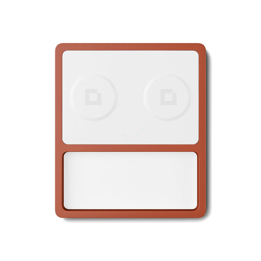 A wireless charging pad with a compartment for charging AirPods or small devices, and another for a smartphone, with a smartphone on top indicating charging status.