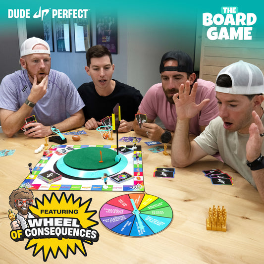 Cover of 'Dude Perfect The Board Game' with cartoon characters and colorful design.
