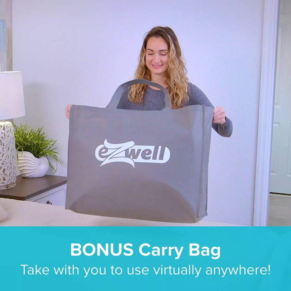 Woman holding a gray eZwell carry bag in a room setting with text about a bonus carry bag.