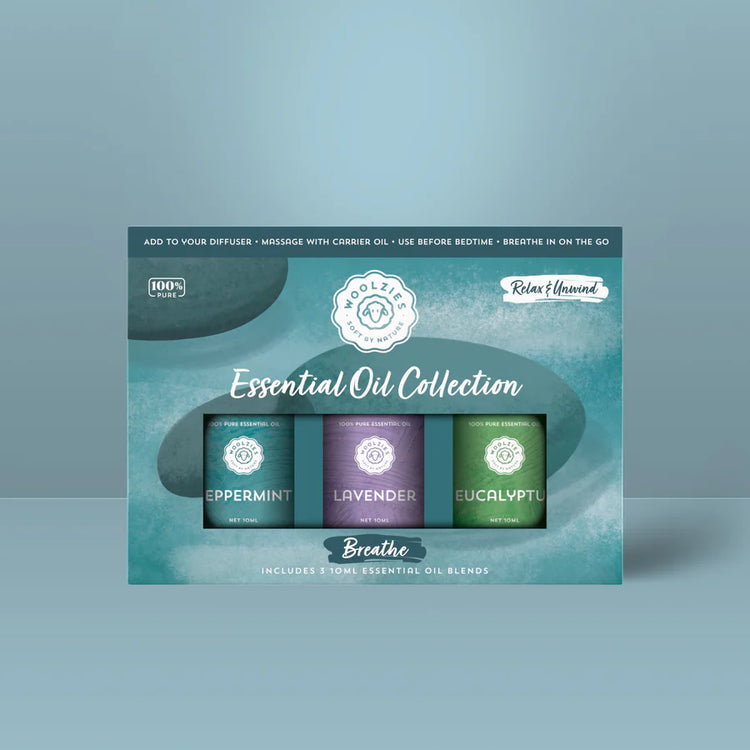 Woolzies Essential Oil Collection packaging on a light blue background