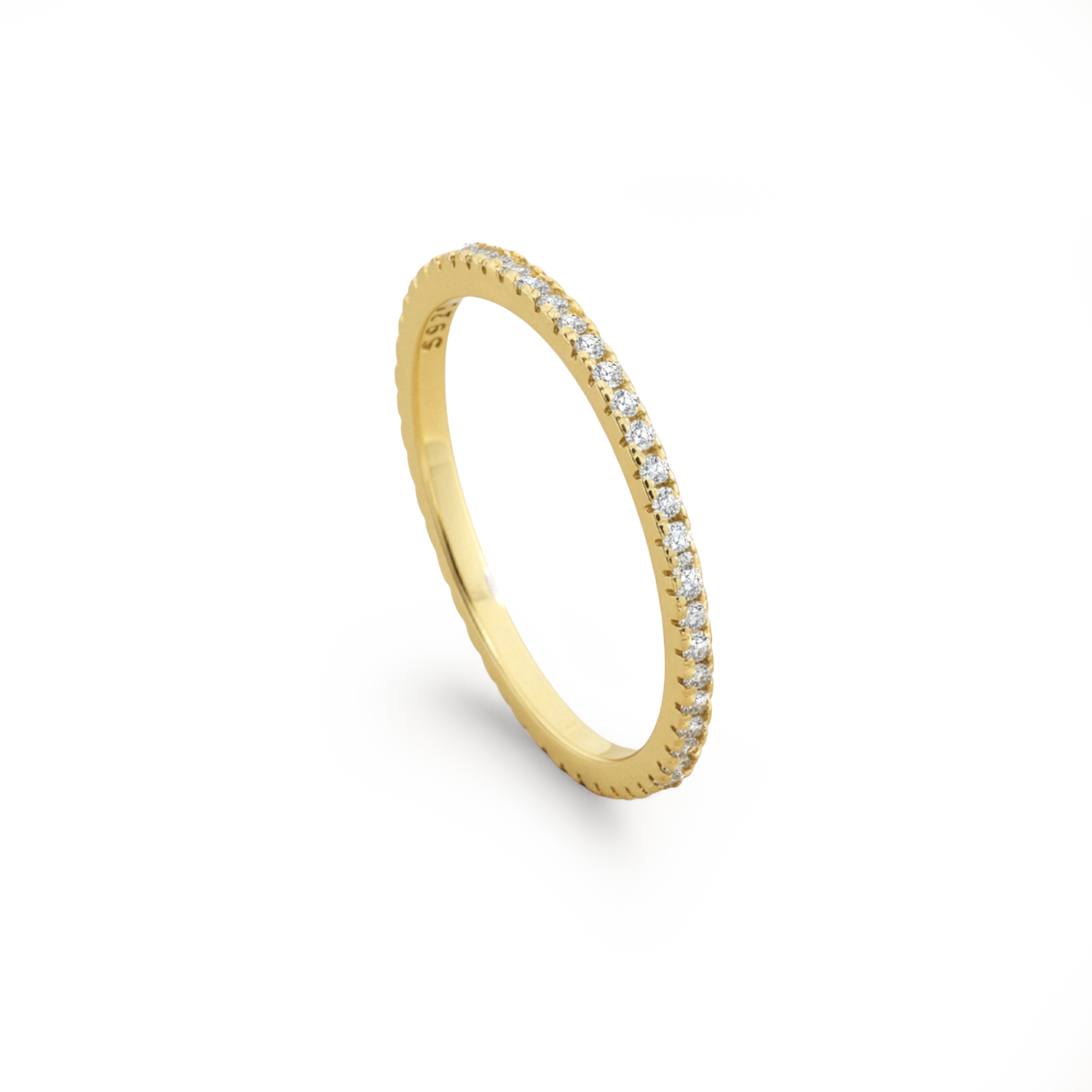 Gold ring with small diamonds on a white background
