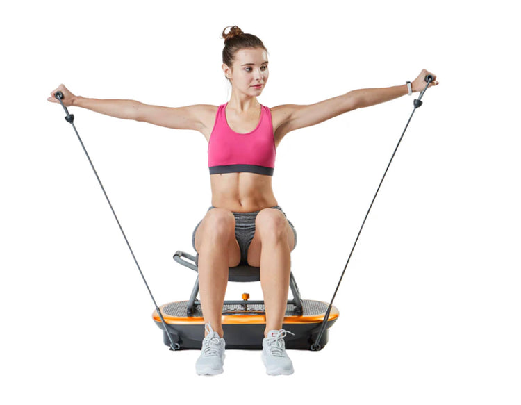 Woman exercising on a fitness device with resistance bands.