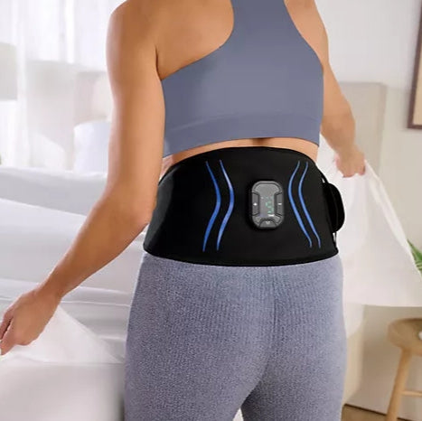 Black waist trainer with digital display and accessories on a white background