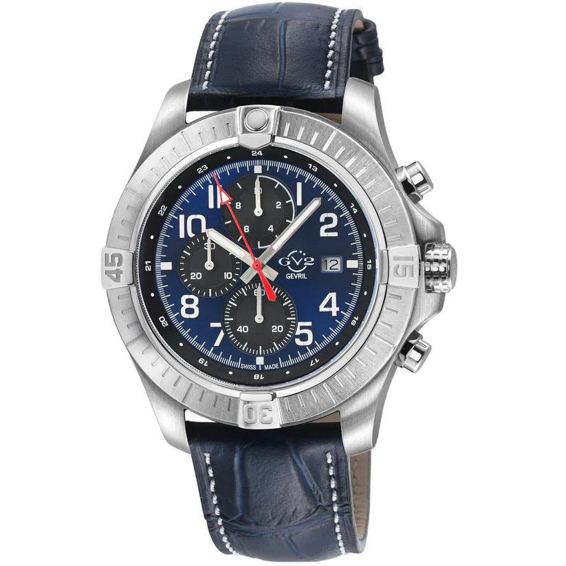 A GV2 Men's T38 Swiss Quartz Chronograph Watch with a round stainless steel case, enamel dial, and multiple sub-dials. It features a silver tone and a curved anti-reflective sapphire crystal.