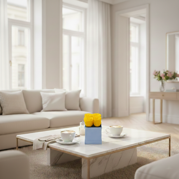 Modern living room with a beige sofa, marble coffee table, and decorative elements.