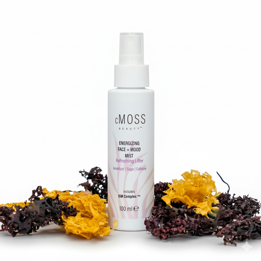 Moss Beauty face and mood mist bottle with dried flowers on a white background