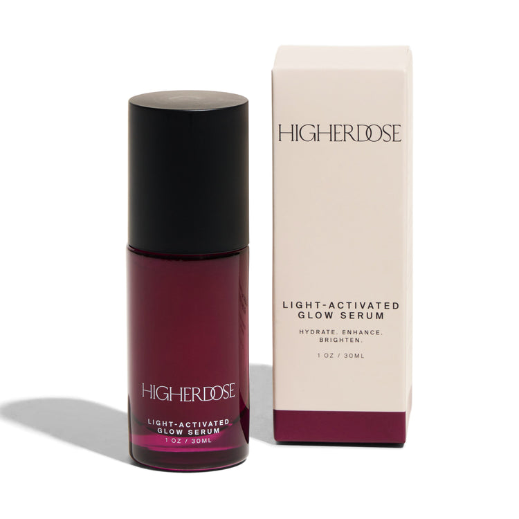 HigherDose light-activated glow serum with packaging on a white background