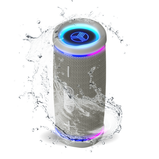 Wireless speaker with colorful LED lights surrounded by water droplets on a white background