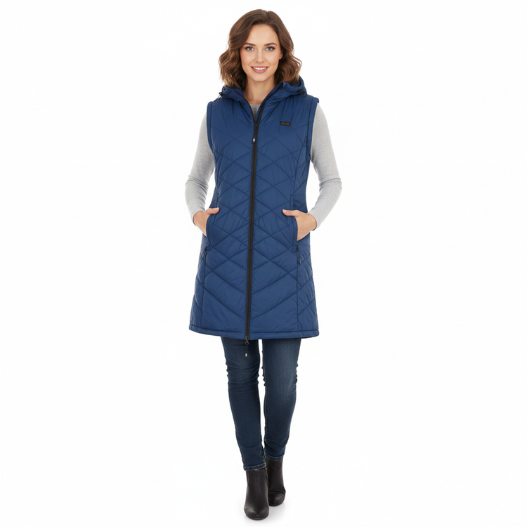 Woman wearing a blue quilted vest on a white background