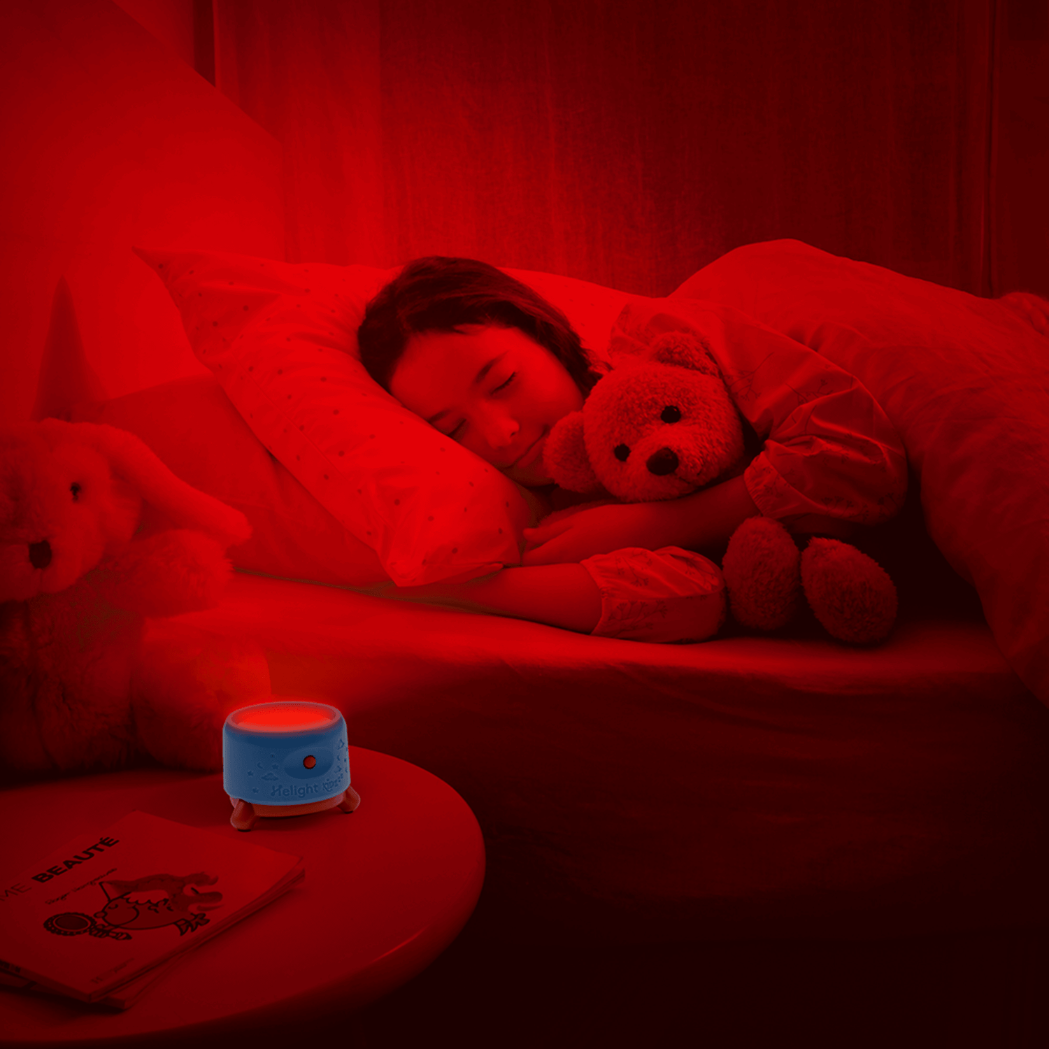 Child sleeping with teddy bears under a red light
